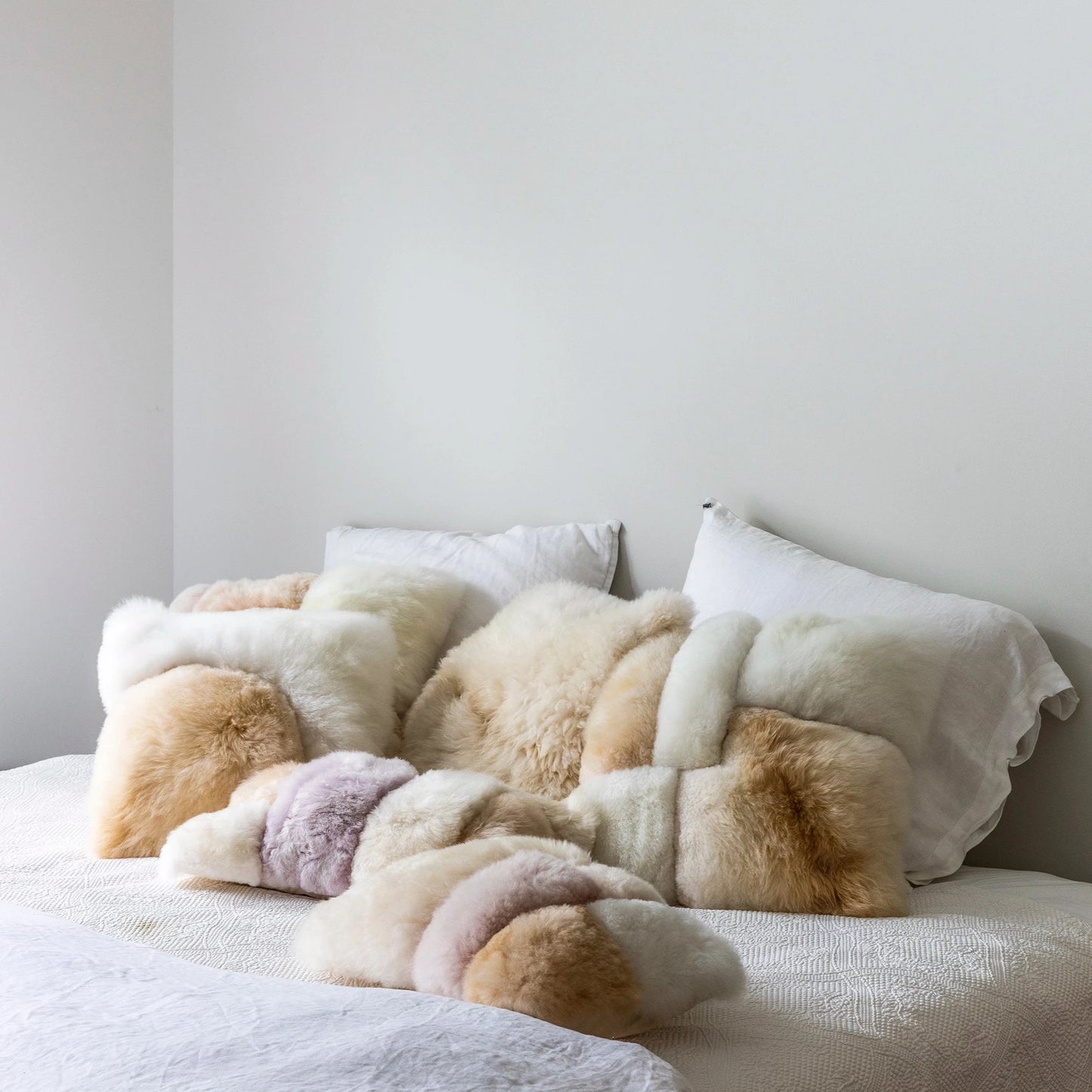 Intiearth FW24 Alpaca Pillow Collection on Bed