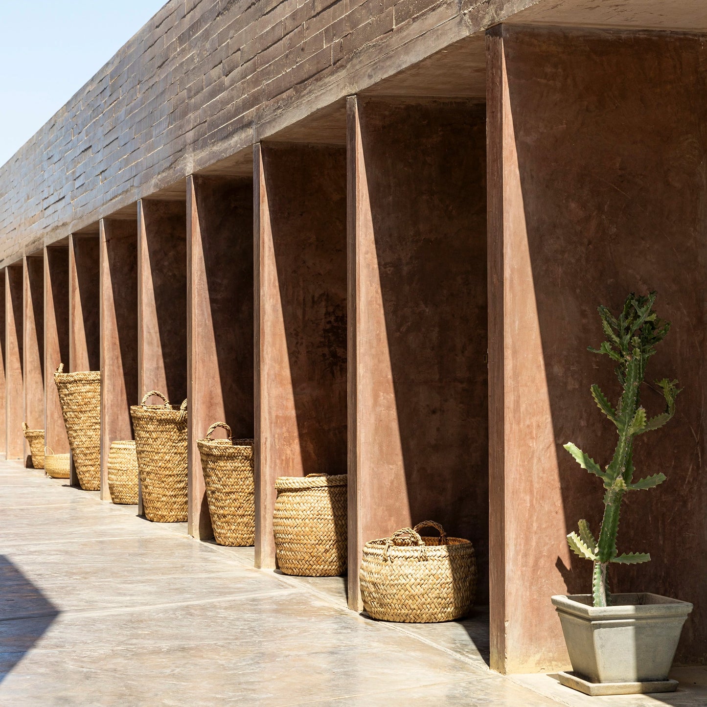 Intiearth Baskets at Paracas Museum in architectural hallway