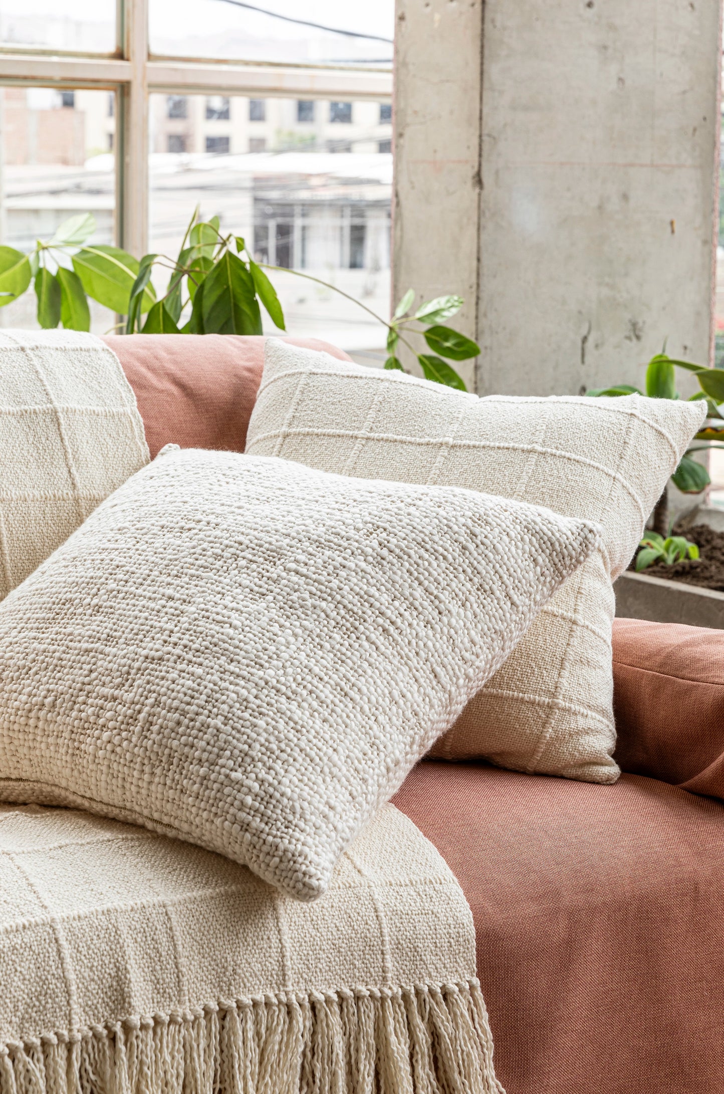 Intiearth luxuriously soft organic handspun cotton 24" square pillow in ecru perfect for adding comfort and a natural touch to any sofa or bed.