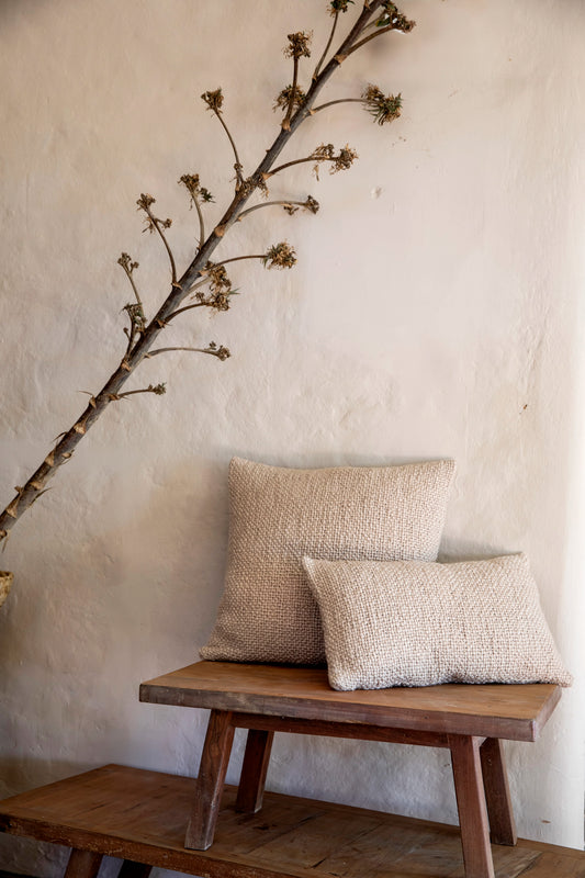 Intiearth luxuriously soft organic handspun cotton lumbar pillow in earthy beige, perfect for adding comfort and a natural touch to any sofa or bed.