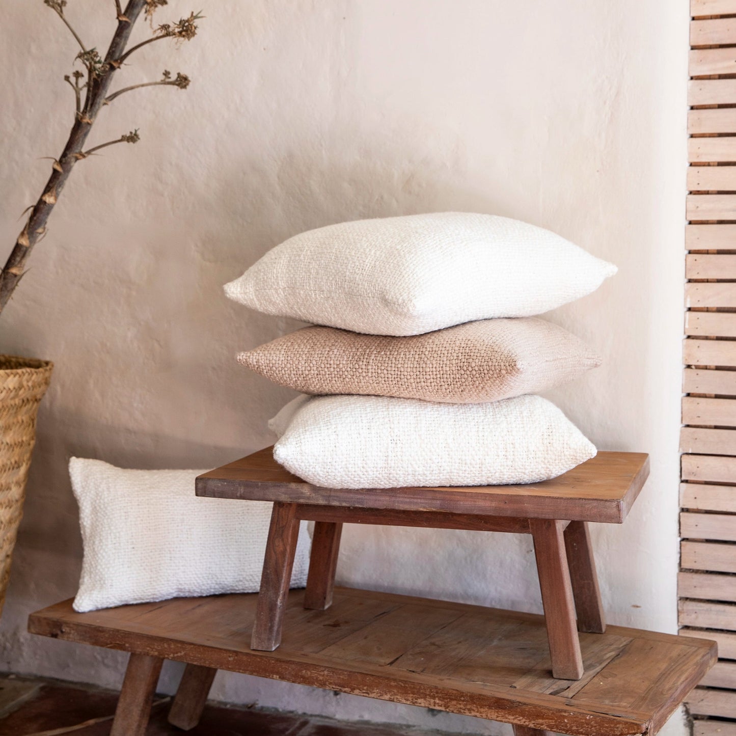 Intiearth luxuriously soft organic handspun cotton lumbar pillow in earthy beige, perfect for adding comfort and a natural touch to any sofa or bed.