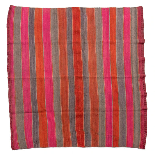 Striped fabric with red, pink, and brown colors on a white background