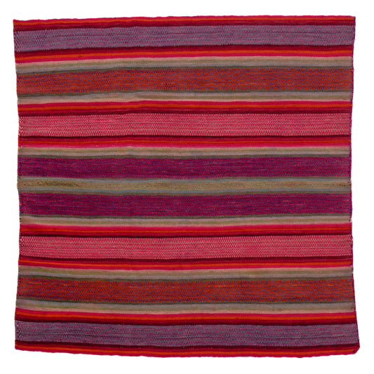 Striped fabric with red and purple hues on a white background
