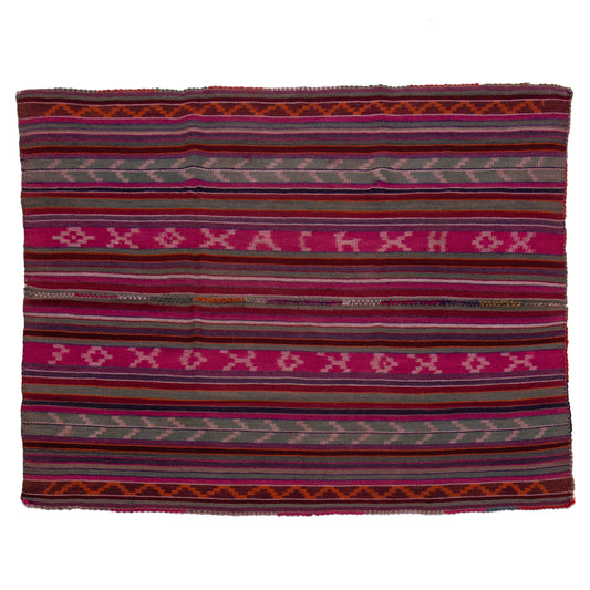 Woven textile with colorful pattern on a white background