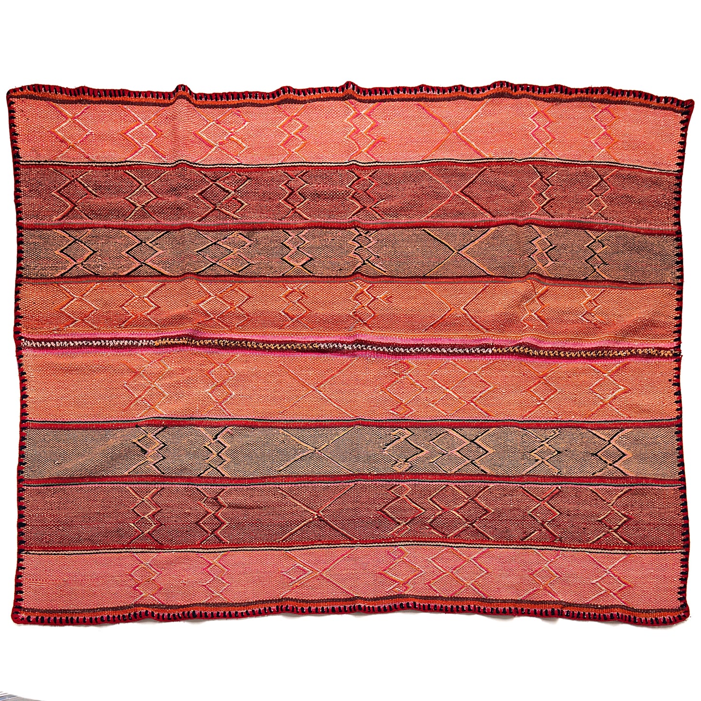 Intiearth vintage Peruvian Frazada textile with colorful geometric patterns and stripes. Traditional handwoven multipurpose textile from Peru, ideal for home décor, can be used as a blanket, rug, throw, or wall hanging. Made of handspun wool and crafted on a backstrap loom.