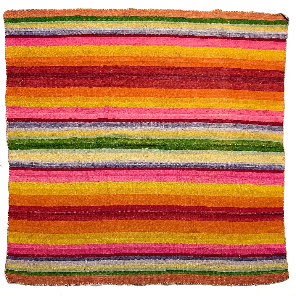 Intiearth vintage Peruvian Frazada textile with colorful geometric patterns and stripes. Traditional handwoven multipurpose textile from Peru, ideal for home décor, can be used as a blanket, rug, throw, or wall hanging. Made of handspun wool and crafted on a backstrap loom.