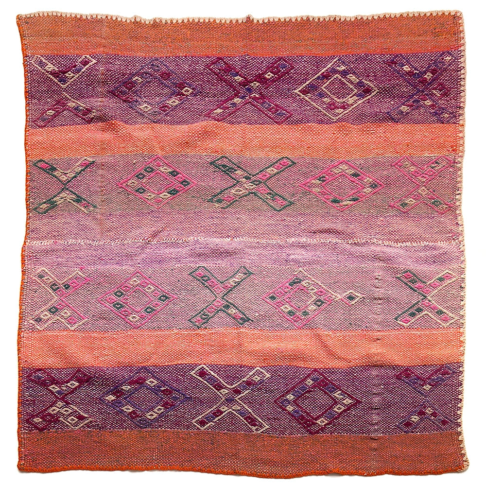 Intiearth vintage Peruvian Frazada textile with colorful geometric patterns and stripes. Traditional handwoven multipurpose textile from Peru, ideal for home décor, can be used as a blanket, rug, throw, or wall hanging. Made of handspun wool and crafted on a backstrap loom.