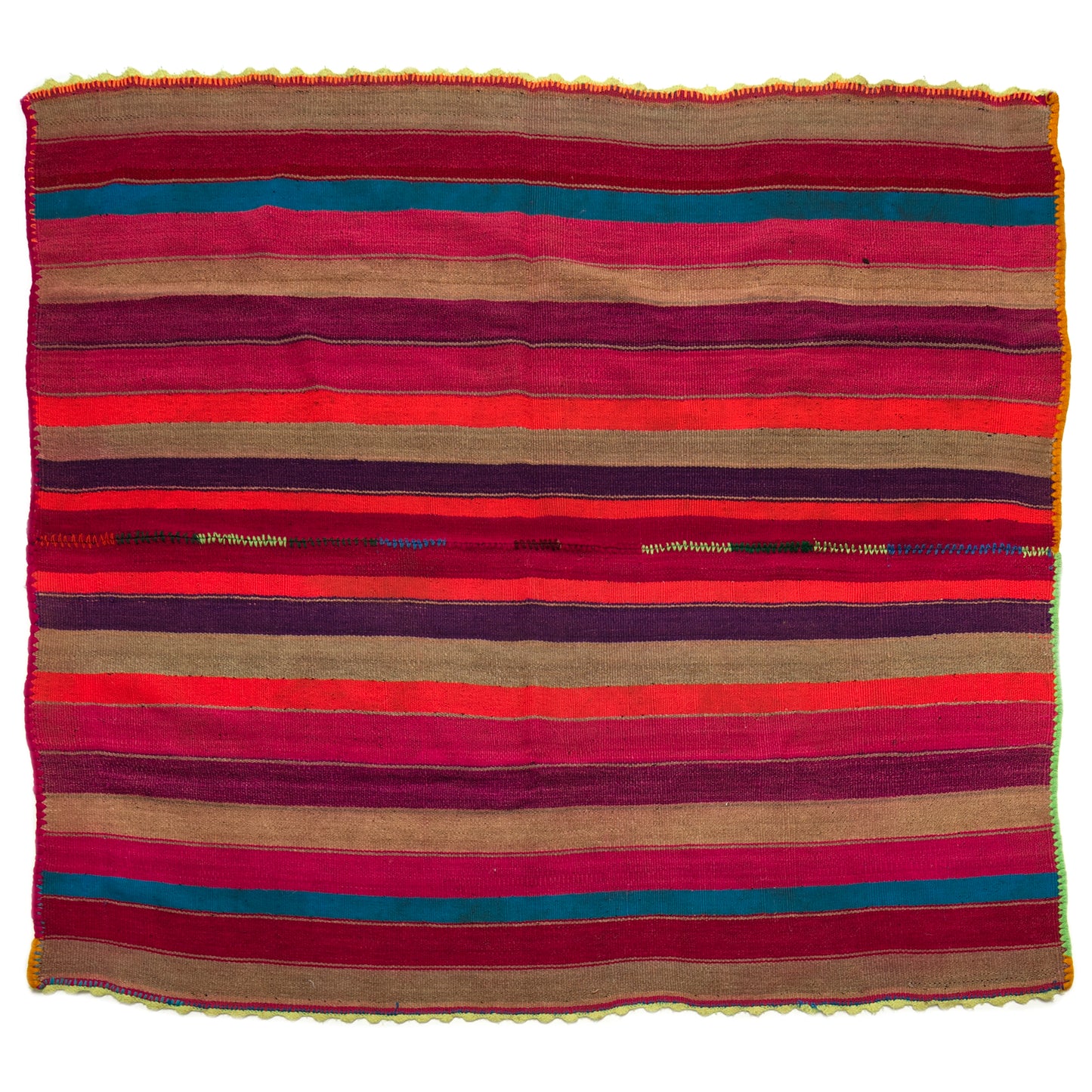 Intiearth vintage Peruvian Frazada textile with colorful geometric patterns and stripes. Traditional handwoven multipurpose textile from Peru, ideal for home décor, can be used as a blanket, rug, throw, or wall hanging. Made of handspun wool and crafted on a backstrap loom.