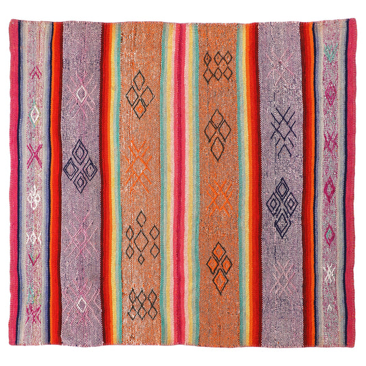 Intiearth vintage Peruvian Frazada textile with colorful geometric patterns and stripes. Traditional handwoven multipurpose textile from Peru, ideal for home décor, can be used as a blanket, rug, throw, or wall hanging. Made of handspun wool and crafted on a backstrap loom.