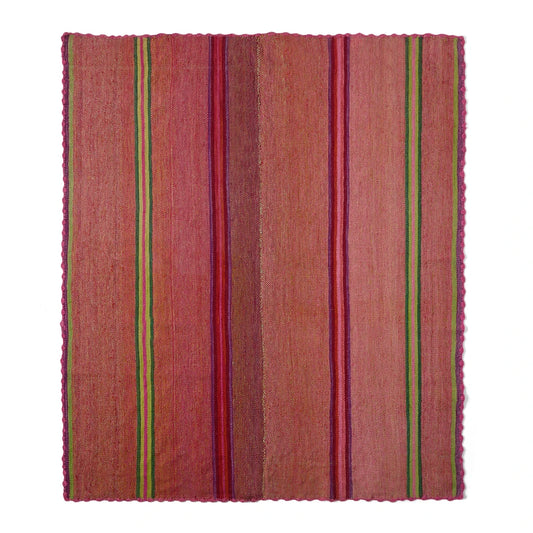 A square woven textile rug or mat with a warm rust-brown base and vertical stripes in pink, burgundy, green, and red, shown flat against a white background.
