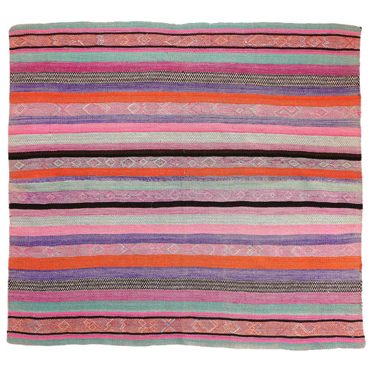 Intiearth vintage Peruvian Frazada textile with colorful geometric patterns and stripes. Traditional handwoven multipurpose textile from Peru, ideal for home décor, can be used as a blanket, rug, throw, or wall hanging. Made of handspun wool and crafted on a backstrap loom.