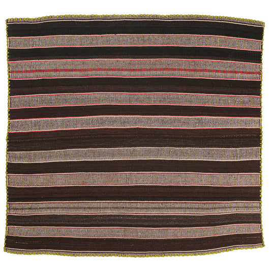 Intiearth vintage Peruvian Frazada textile with colorful geometric patterns and stripes. Traditional handwoven multipurpose textile from Peru, ideal for home décor, can be used as a blanket, rug, throw, or wall hanging. Made of handspun wool and crafted on a backstrap loom.