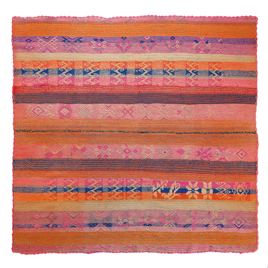Intiearth vintage Peruvian Frazada textile with colorful geometric patterns and stripes. Traditional handwoven multipurpose textile from Peru, ideal for home décor, can be used as a blanket, rug, throw, or wall hanging. Made of handspun wool and crafted on a backstrap loom.