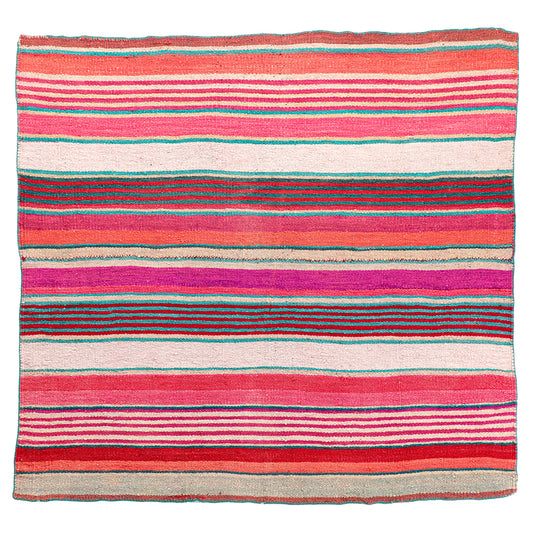 Intiearth vintage Peruvian Frazada textile with colorful geometric patterns and stripes. Traditional handwoven multipurpose textile from Peru, ideal for home décor, can be used as a blanket, rug, throw, or wall hanging. Made of handspun wool and crafted on a backstrap loom.