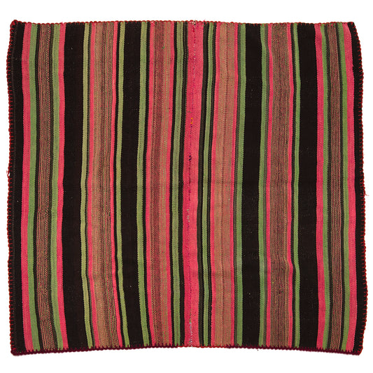 Intiearth vintage Peruvian Frazada textile with colorful geometric patterns and stripes. Traditional handwoven multipurpose textile from Peru, ideal for home décor, can be used as a blanket, rug, throw, or wall hanging. Made of handspun wool and crafted on a backstrap loom.