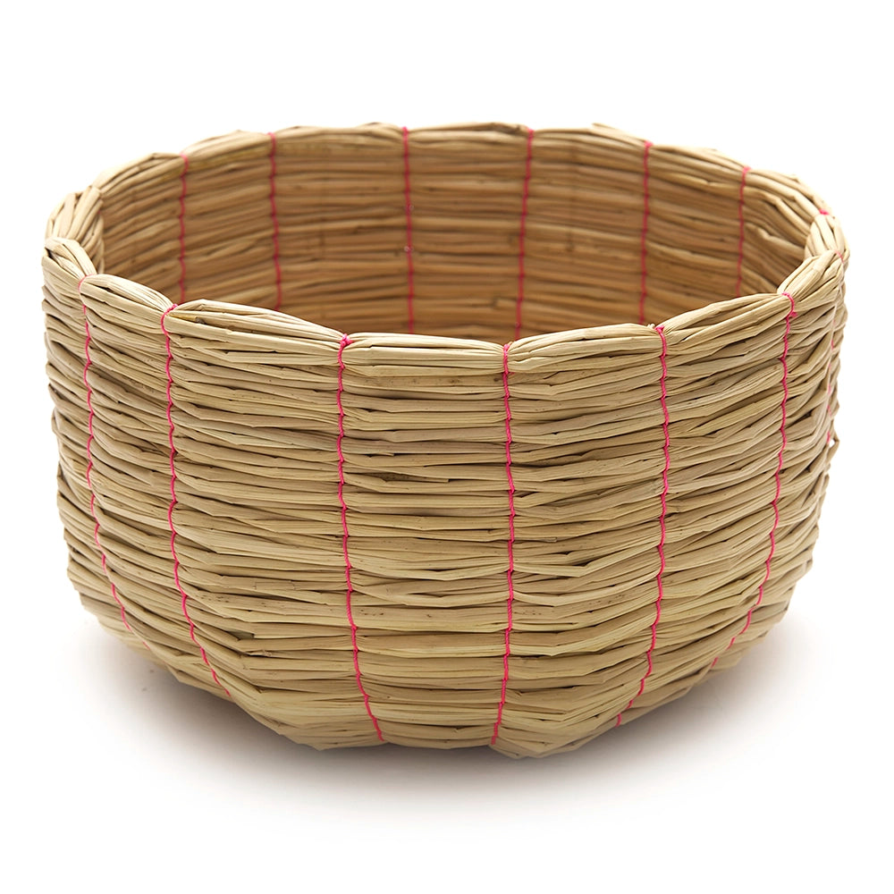 Intiearth Puno Woven basket with hot pink thread on a white background