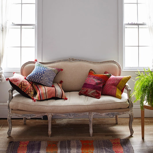 Intiearth Colorful decorative pillow made from handwoven Peruvian frazada, crafted with hand spun wool in a fair trade workshop