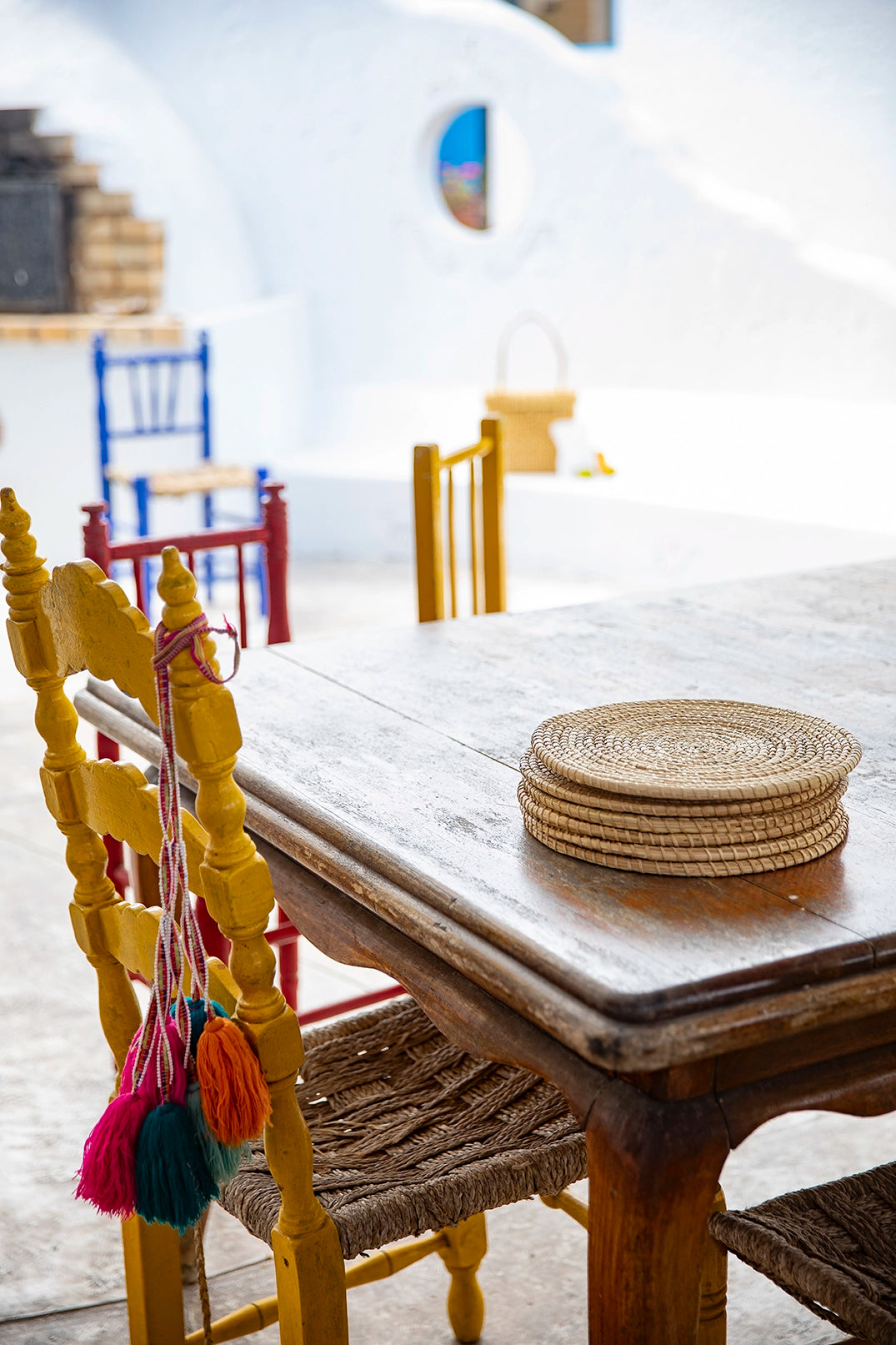 Intiearth_table_top_placemats_with_colorful_tassels_on_chaircopy