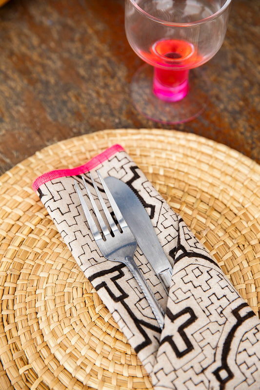 Intiearth_table_top_shipibo_napkins_folded_with_placemat_tropical_glasscopy