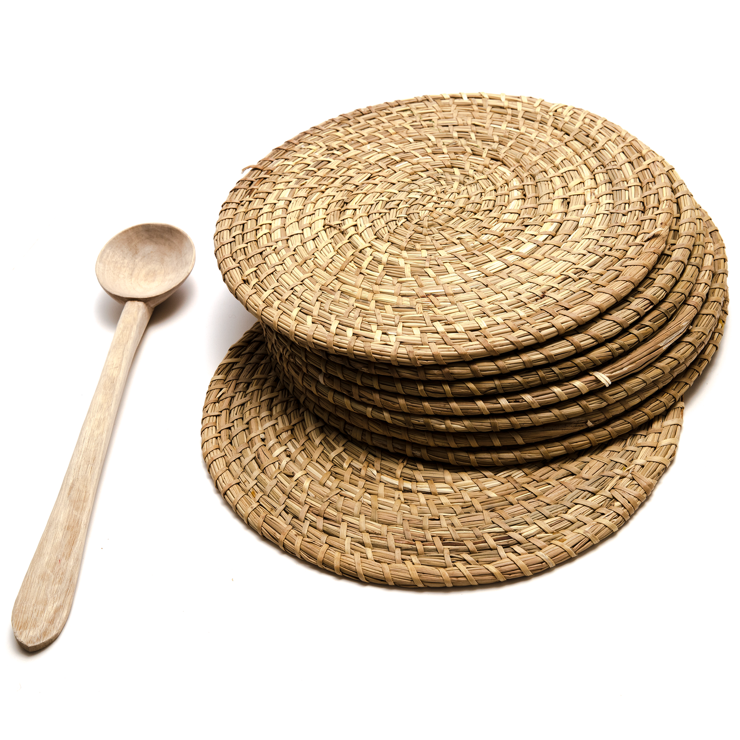 Intiearth natural fiber coiled placemat made from dried junco grass, offering a rustic yet elegant touch to your table setting.