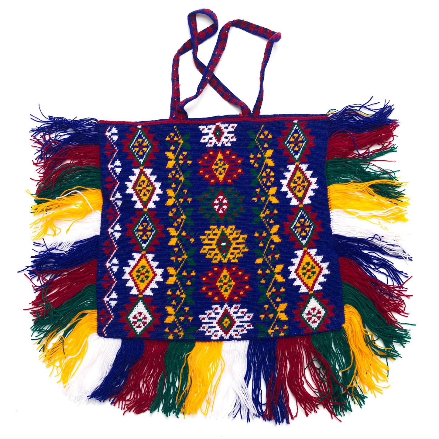 Colorful handbag with intricate patterns and fringes on a white background
