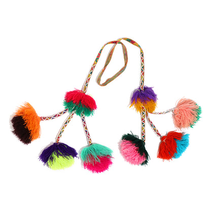 Traditional colorful Peruvian decorative tassel, handmade and one-of-a-kind, often used in festivals and celebrations 