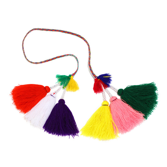 Traditional colorful Peruvian decorative tassel, handmade and one-of-a-kind, often used in festivals and celebrations 