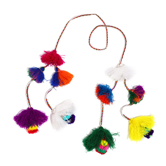 Traditional colorful Peruvian decorative tassel, handmade and one-of-a-kind, often used in festivals and celebrations 