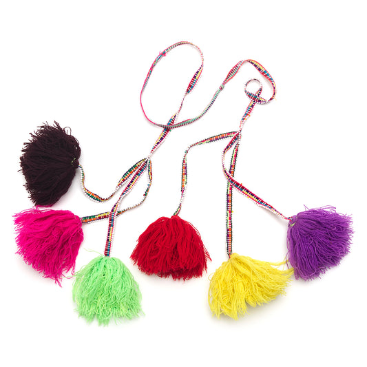 Traditional colorful Peruvian decorative tassel, handmade and one-of-a-kind, often used in festivals and celebrations 