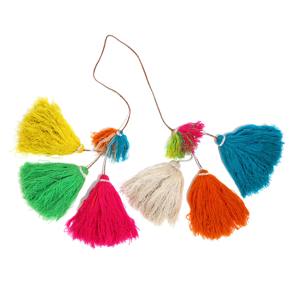 Traditional colorful Peruvian decorative tassel, handmade and one-of-a-kind, often used in festivals and celebrations 