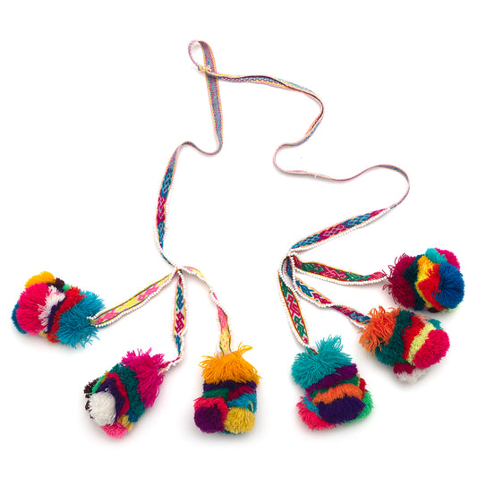 Traditional colorful Peruvian decorative tassel, handmade and one-of-a-kind, often used in festivals and celebrations 