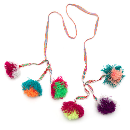 Traditional colorful Peruvian decorative tassel, handmade and one-of-a-kind, often used in festivals and celebrations 