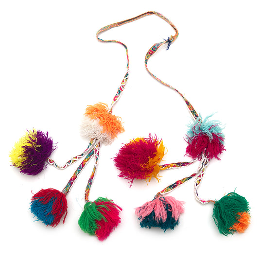 Traditional colorful Peruvian decorative tassel, handmade and one-of-a-kind, often used in festivals and celebrations 