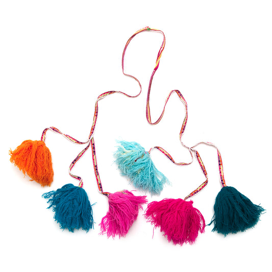Traditional colorful Peruvian decorative tassel, handmade and one-of-a-kind, often used in festivals and celebrations 