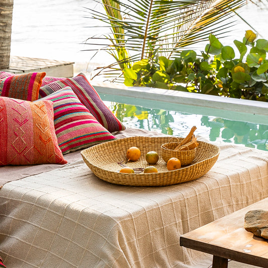 Intiearth Handwoven oversized basket platter made of natural fibers, ideal as a serving dish or decorative centerpiece.