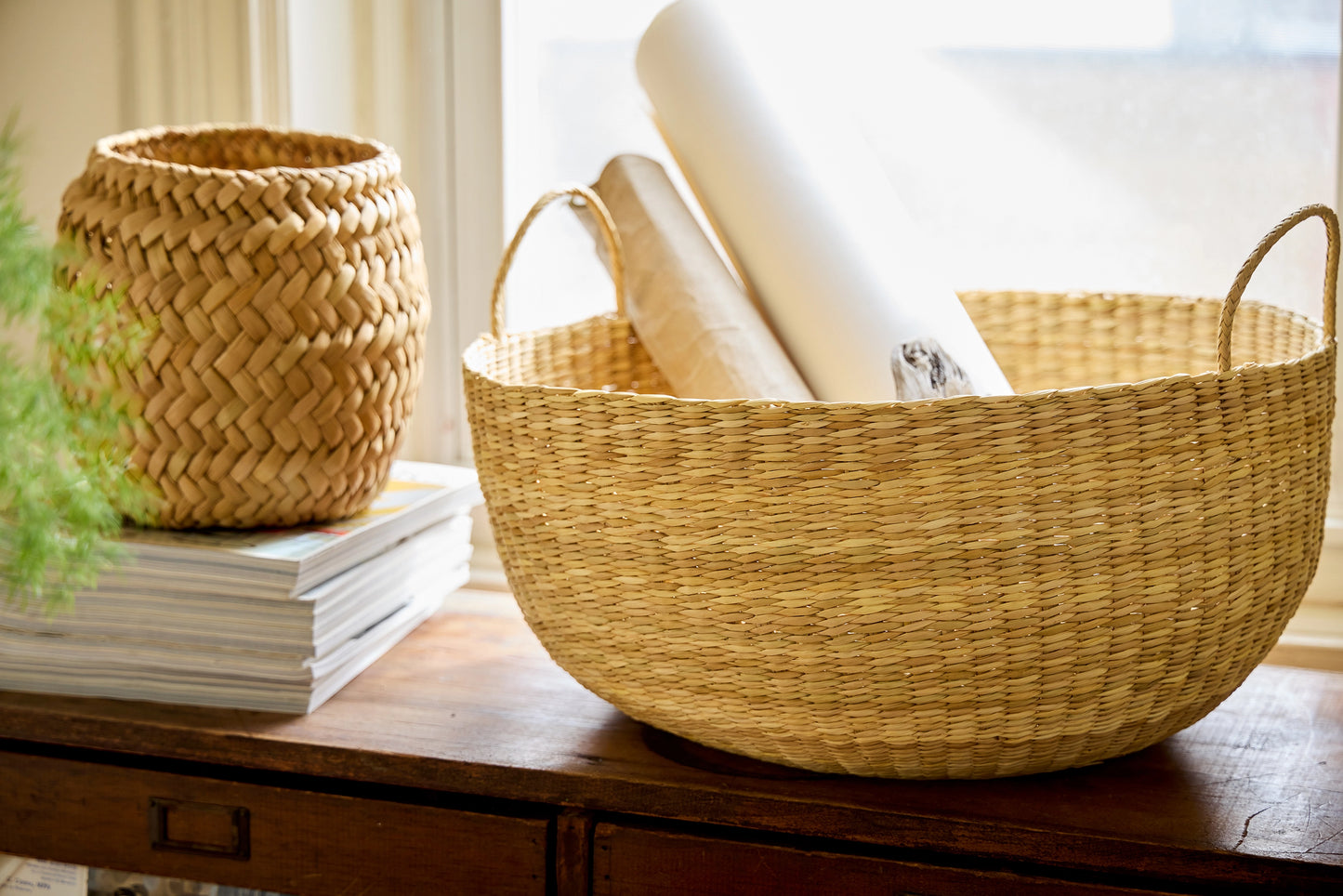 Woven baskets on a wooden surface with a blurred background