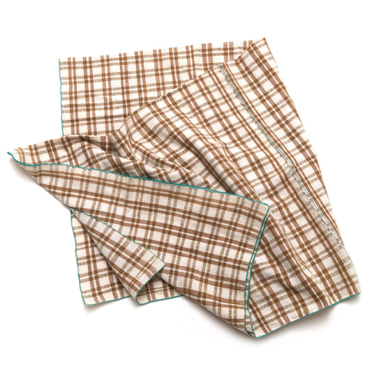 Set of plaid napkins on a white background