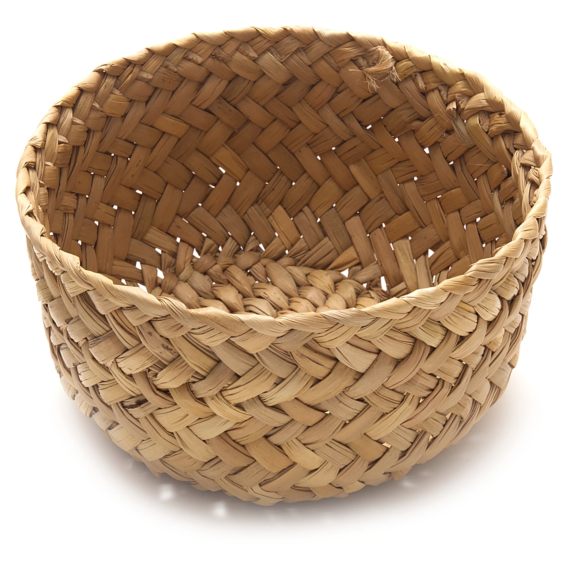 Woven basket with a herringbone pattern on a white background