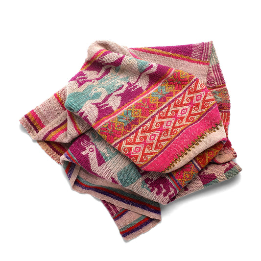 Intiearth vintage Peruvian Frazada textile with colorful geometric patterns and stripes. Traditional handwoven multipurpose textile from Peru, ideal for home décor, can be used as a blanket, rug, throw, or wall hanging. Made of handspun wool and crafted on a backstrap loom.