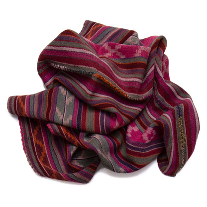 Striped fabric with pink, purple, and orange pattern on a white background