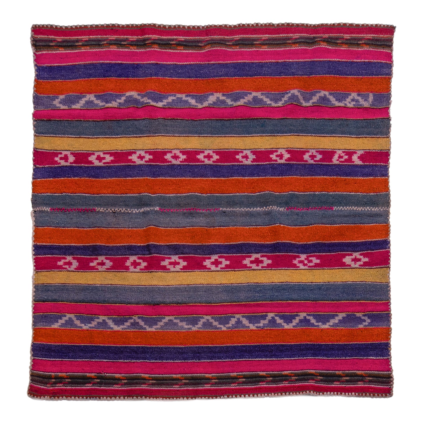 Colorful striped patterned rug on a white background