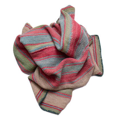 Striped fabric with red, green, and gray pattern on a white background