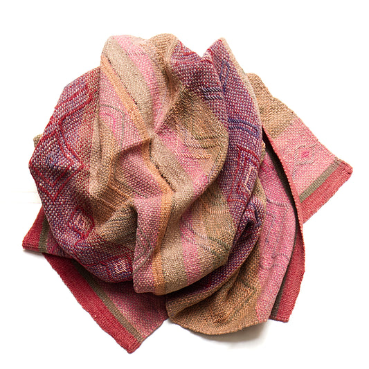 Intiearth vintage Peruvian Frazada textile with colorful geometric patterns and stripes. Traditional handwoven multipurpose textile from Peru, ideal for home décor, can be used as a blanket, rug, throw, or wall hanging. Made of handspun wool and crafted on a backstrap loom.