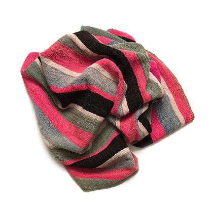 Intiearth vintage Peruvian Frazada textile with colorful geometric patterns and stripes. Traditional handwoven multipurpose textile from Peru, ideal for home décor, can be used as a blanket, rug, throw, or wall hanging. Made of handspun wool and crafted on a backstrap loom.