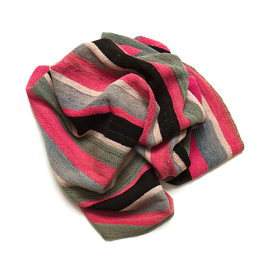 Intiearth vintage Peruvian Frazada textile with colorful geometric patterns and stripes. Traditional handwoven multipurpose textile from Peru, ideal for home décor, can be used as a blanket, rug, throw, or wall hanging. Made of handspun wool and crafted on a backstrap loom.