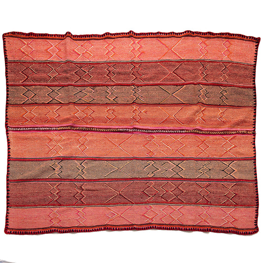 Intiearth vintage Peruvian Frazada textile with colorful geometric patterns and stripes. Traditional handwoven multipurpose textile from Peru, ideal for home décor, can be used as a blanket, rug, throw, or wall hanging. Made of handspun wool and crafted on a backstrap loom.