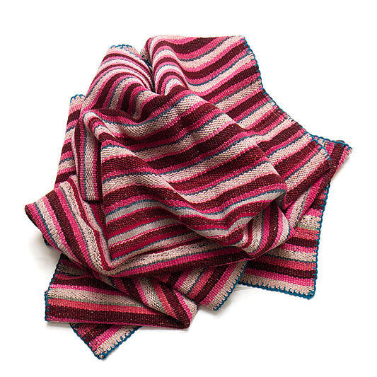 Intiearth vintage Peruvian Frazada textile with colorful geometric patterns and stripes. Traditional handwoven multipurpose textile from Peru, ideal for home décor, can be used as a blanket, rug, throw, or wall hanging. Made of handspun wool and crafted on a backstrap loom.