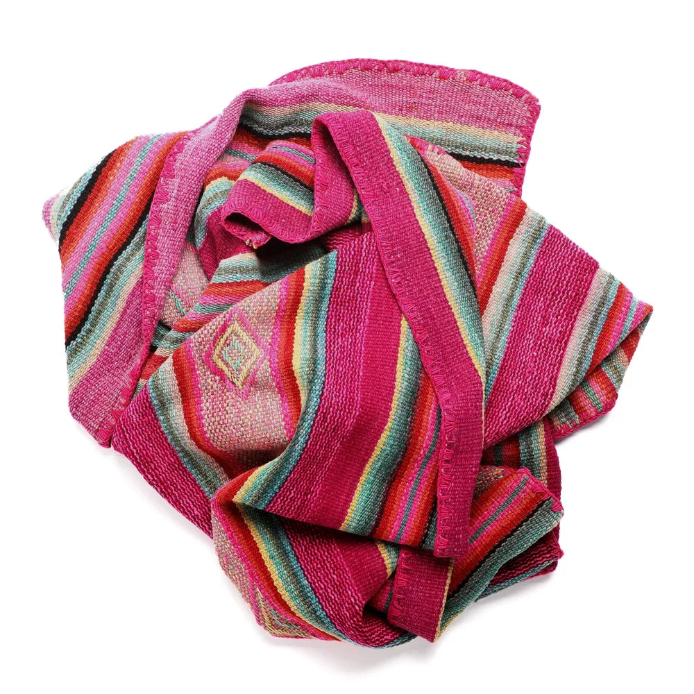 Intiearth vintage Peruvian Frazada textile with colorful geometric patterns and stripes. Traditional handwoven multipurpose textile from Peru, ideal for home décor, can be used as a blanket, rug, throw, or wall hanging. Made of handspun wool and crafted on a backstrap loom.