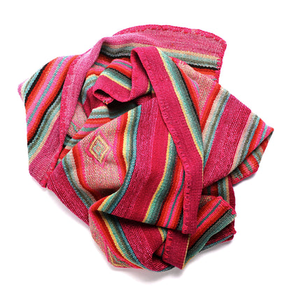 Intiearth vintage Peruvian Frazada textile with colorful geometric patterns and stripes. Traditional handwoven multipurpose textile from Peru, ideal for home décor, can be used as a blanket, rug, throw, or wall hanging. Made of handspun wool and crafted on a backstrap loom.