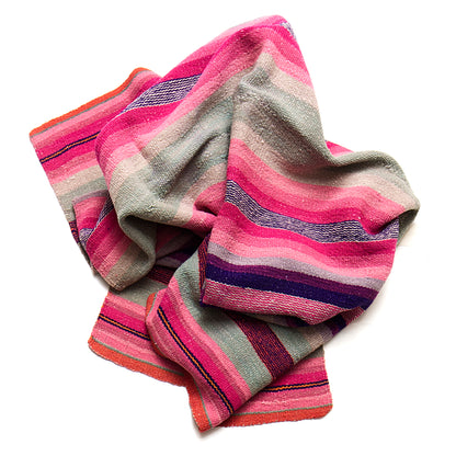 Intiearth vintage Peruvian Frazada textile with colorful geometric patterns and stripes. Traditional handwoven multipurpose textile from Peru, ideal for home décor, can be used as a blanket, rug, throw, or wall hanging. Made of handspun wool and crafted on a backstrap loom.